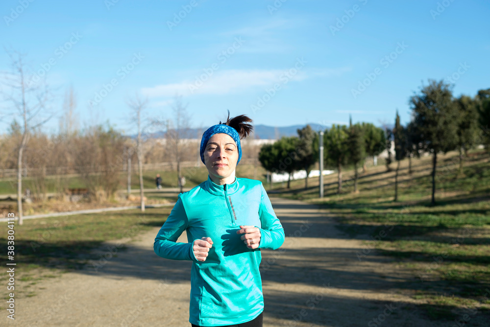 Fitness girl training running in the morning park Fitness girl training running in the morning park