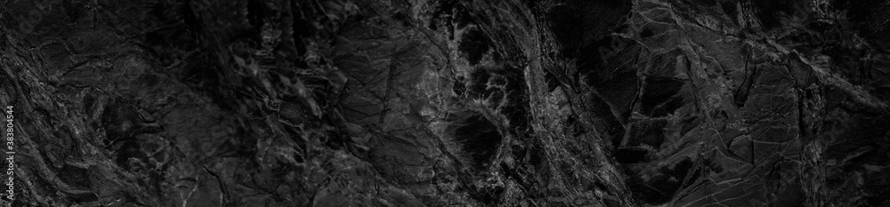Black and white abstract background. Black stone rock grunge background. Dark rock texture. Black and white abstract background. Black stone rock grunge background. Dark rock texture.