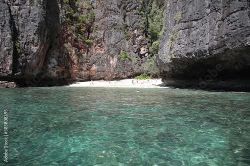 View of Maya Bay with people swimming and snorkeling at beach in Phi Phi island, Krabi province, Thailand. 
