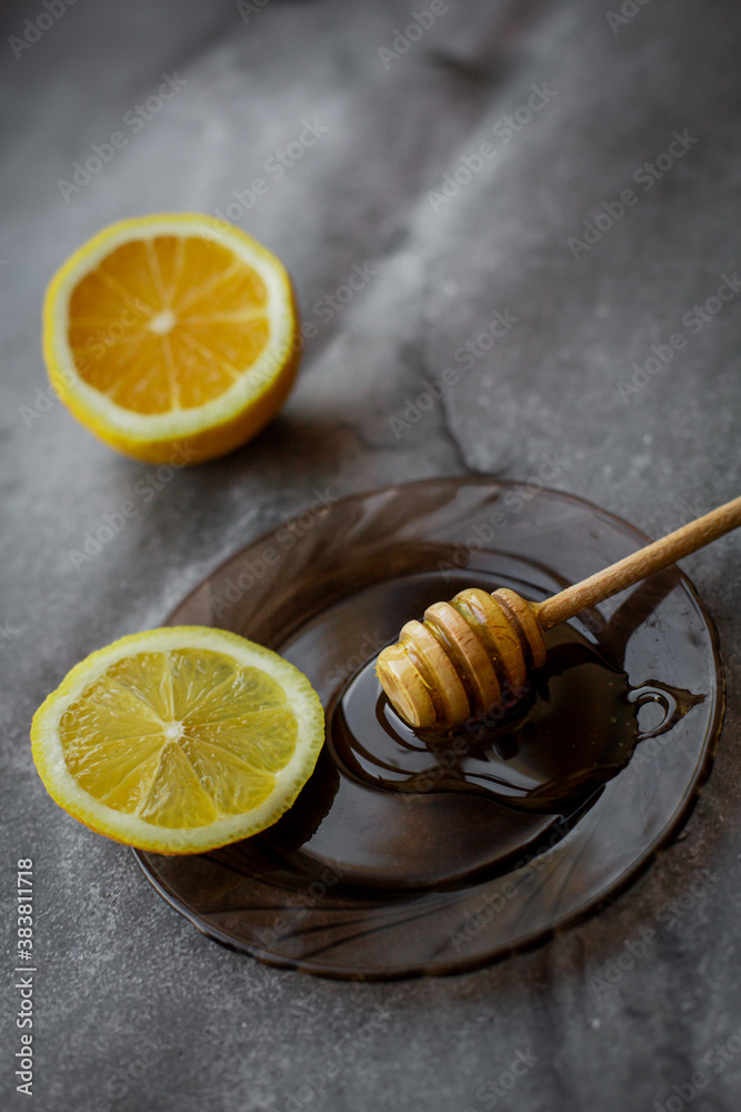 wooden spoon of honey with lemon wooden spoon of honey with lemon