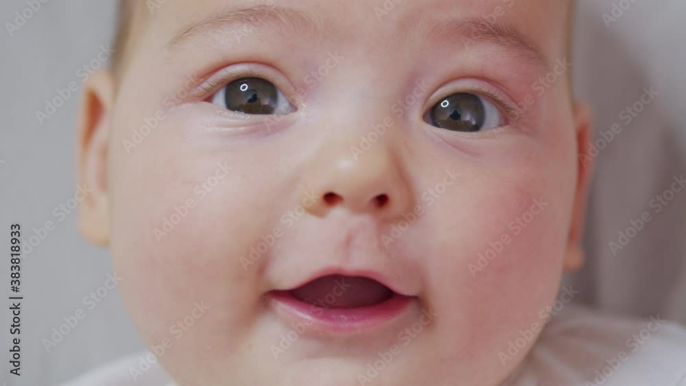 Cute baby smiling and looking in the camera close up. Cute baby smiling and looking in the camera close up.