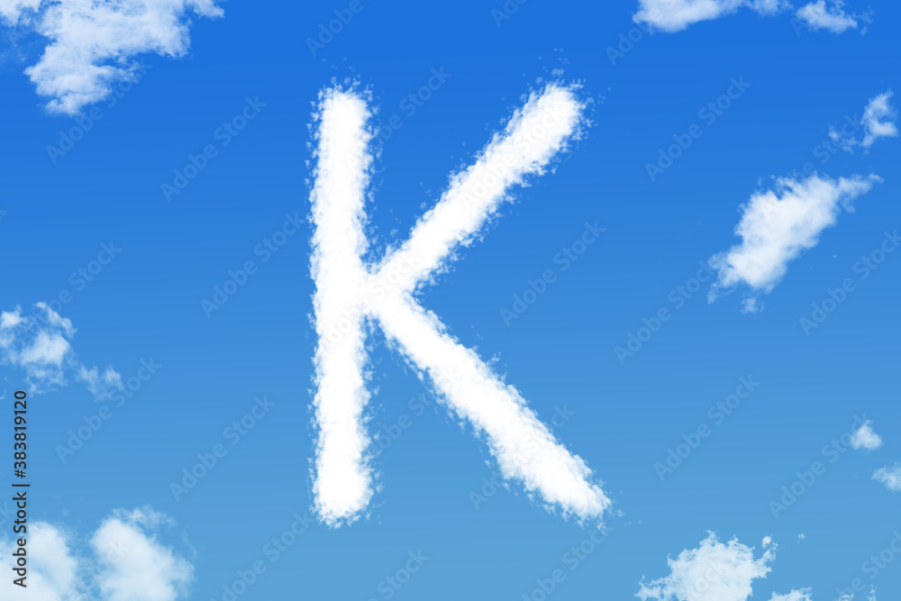 Letter K cloud shape on blue sky