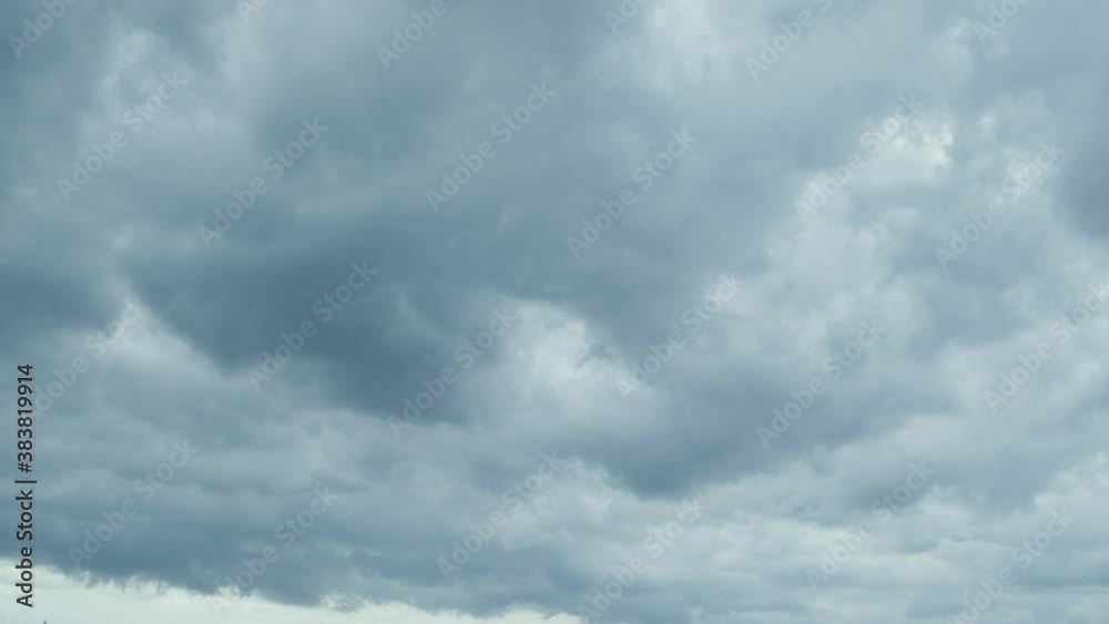 Timelapse of angry dark clouds moving across sky, storm coming, natural disaster Timelapse of angry dark clouds moving across sky, storm coming, natural disaster