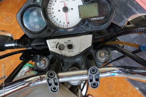 Jepara, 18 September 2020  Honda Cb150R motorcycle keyhole ignition for starter switch or engine control panel and locking handlebar. © setyahery