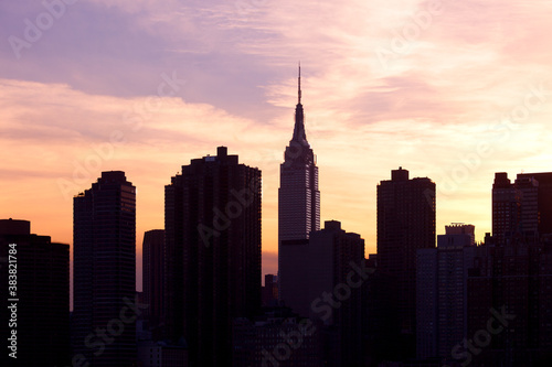 Cityscape of New York City at sunset.