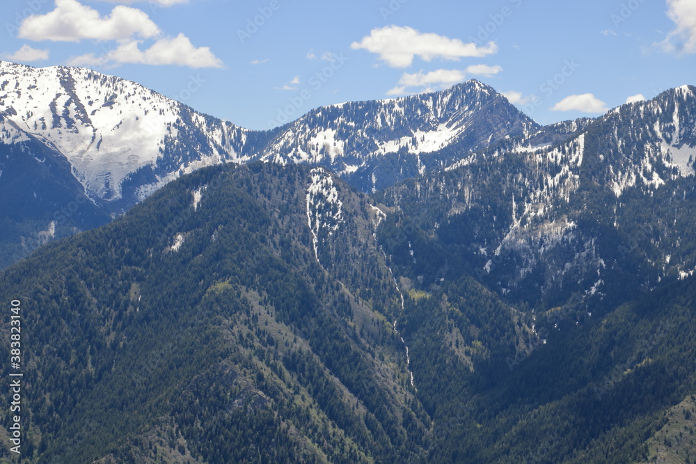 Tall snowcapped peaks of the Wasatch mountains in late May, Salt Lake City, Utah
