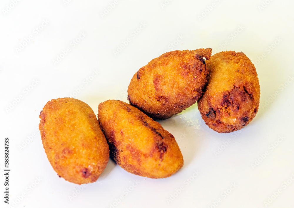 Croquettes surrounded by white background
