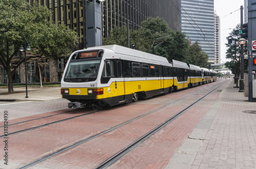 Tram traveling through downtown Dallas.