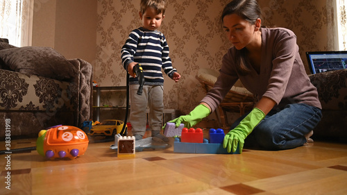 Mom disinfects toys for the child