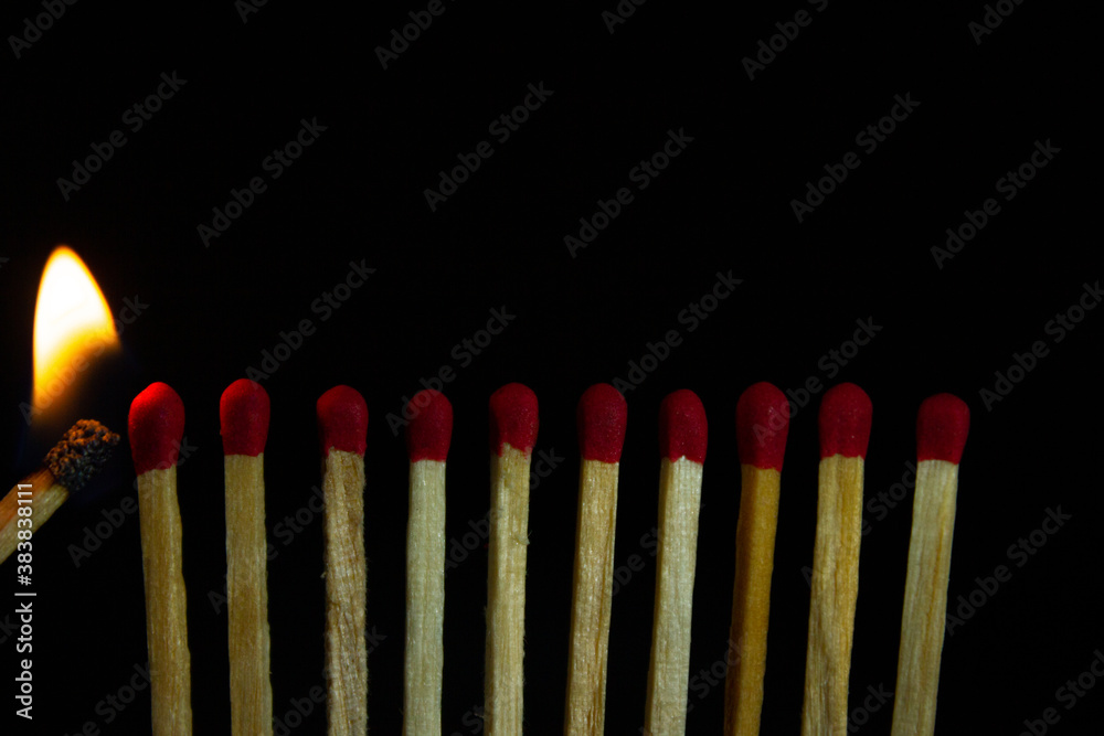 Group of red match burning isolated on black background. Group of red match burning isolated on black background.