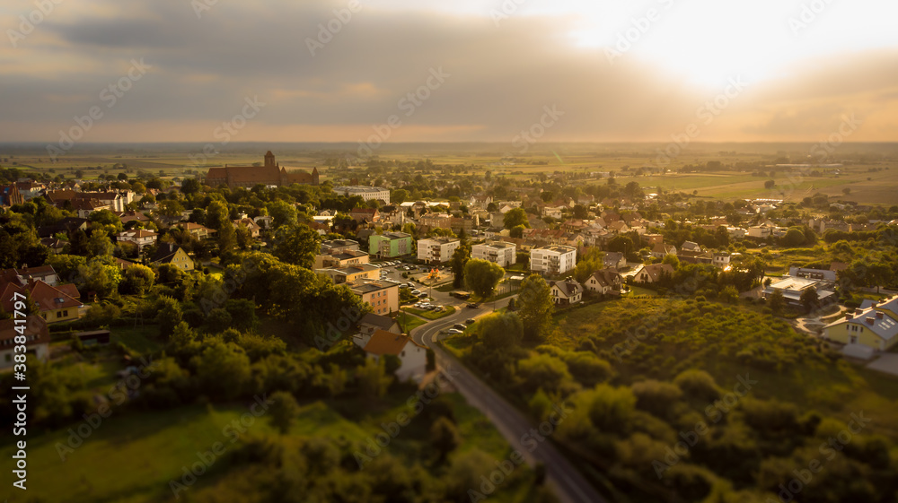 Fototapeta premium Kwidzyn, Poland - March 30, 2020: The view of the city from above. The Teutonic castle in Kwidzyn and the Graniczna street.