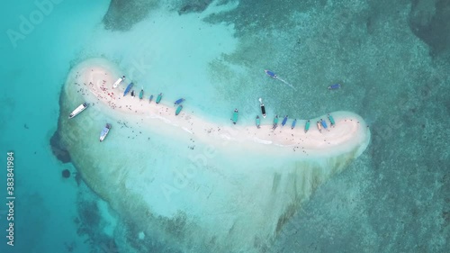 Aerial view footage of beautiful Sandbank island in clear turquoise blue ocean water at the Island of Redang, Terangganu Malaysia