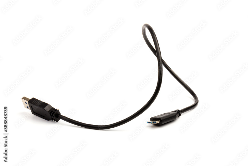USB cable close up on white background. Charge, plugging, equipment and electricity USB cable close up on white background. Charge, plugging, equipment and electricity