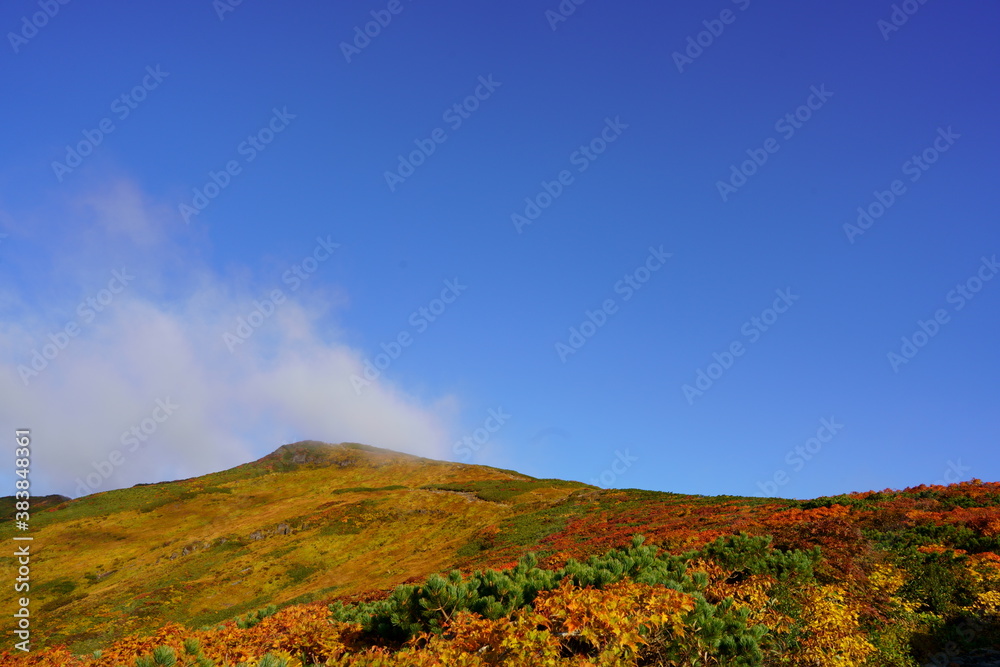 Scenery of Mt. Kurikoma in Japan with beautiful autumn colors Scenery of Mt. Kurikoma in Japan with beautiful autumn colors