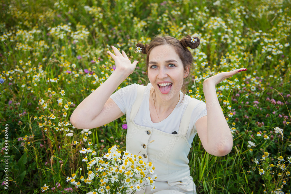 Young girl. Chamomile field. Beige jumpsuit. Young girl. Chamomile field. Beige jumpsuit.