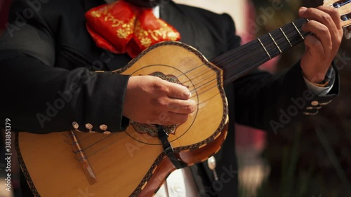 Mariachi Playing a Mexican Instrument Called Vihuela in Mexico City photo