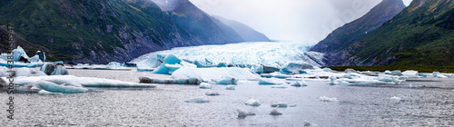 Spencer Glacier and icebergs of Alaska in fall tourist destination photo