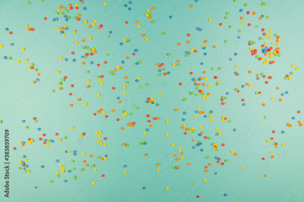 sprinkles background, sugar sprinkle confetti, decoration for cake and bakery. Top view, flat lay. pastel colors sprinkles background, sugar sprinkle confetti, decoration for cake and bakery. Top view, flat lay. pastel colors