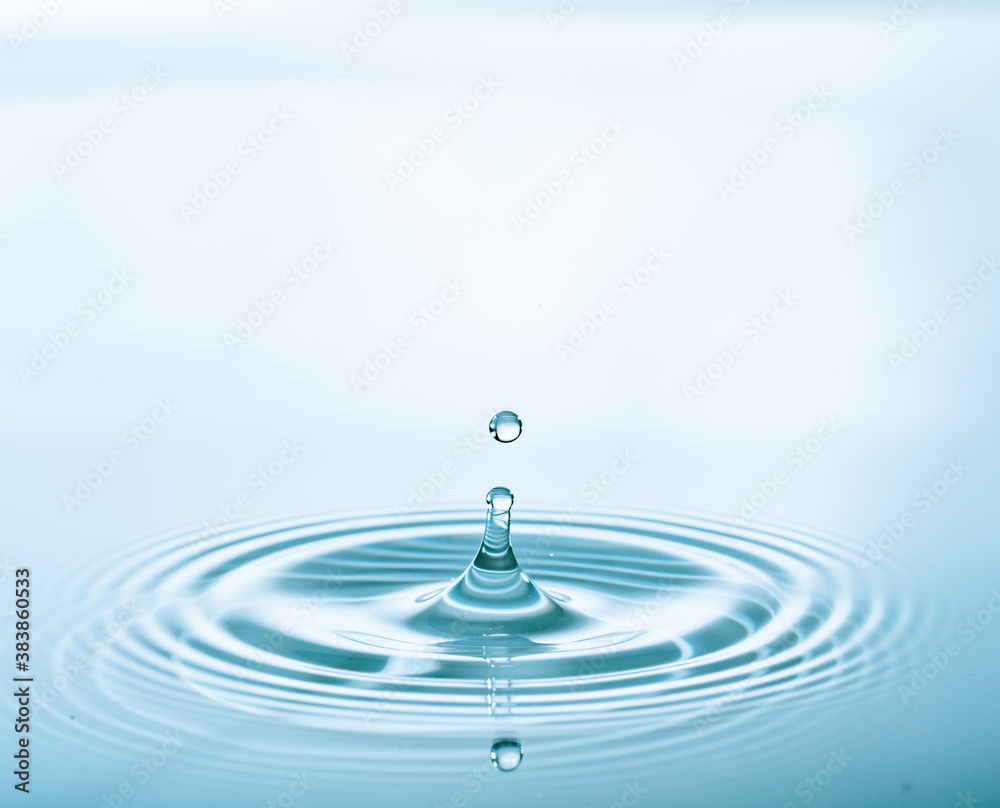 Water splash of falling drop with circular waves Water splash of falling drop with circular waves