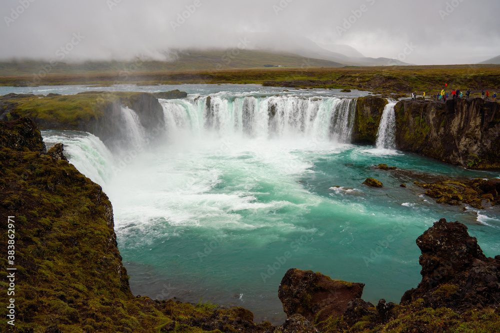 The Godafoss Icelandic: Goðafoss waterfall of the gods, is a famous waterfall in Iceland. The Godafoss Icelandic: Goðafoss waterfall of the gods, is a famous waterfall in Iceland.