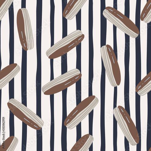 Random seamless bakery pattern with sweet eclairs. Tasty ornament in grey tones with chocolate glaze on monochrome striped background.