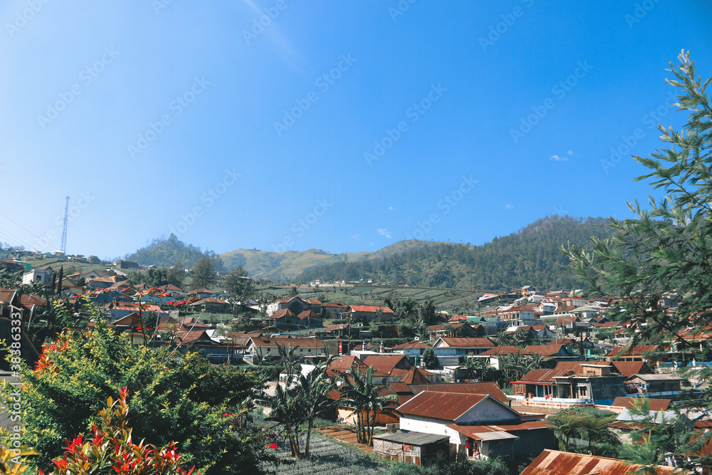Beautiful Village on mountain with blue clear background in Tawangmangu, Solo, Indonesia.