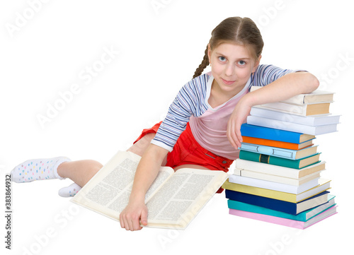 Girl sits having leant the elbows on a books