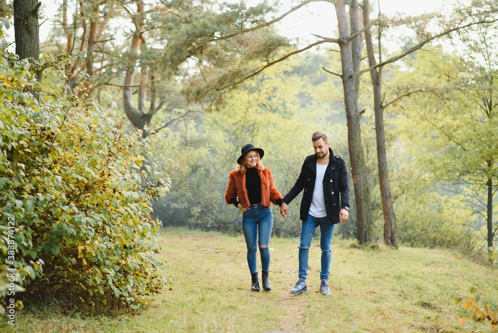 Fototapeta premium Romantic young couple in love relaxing outdoors in park