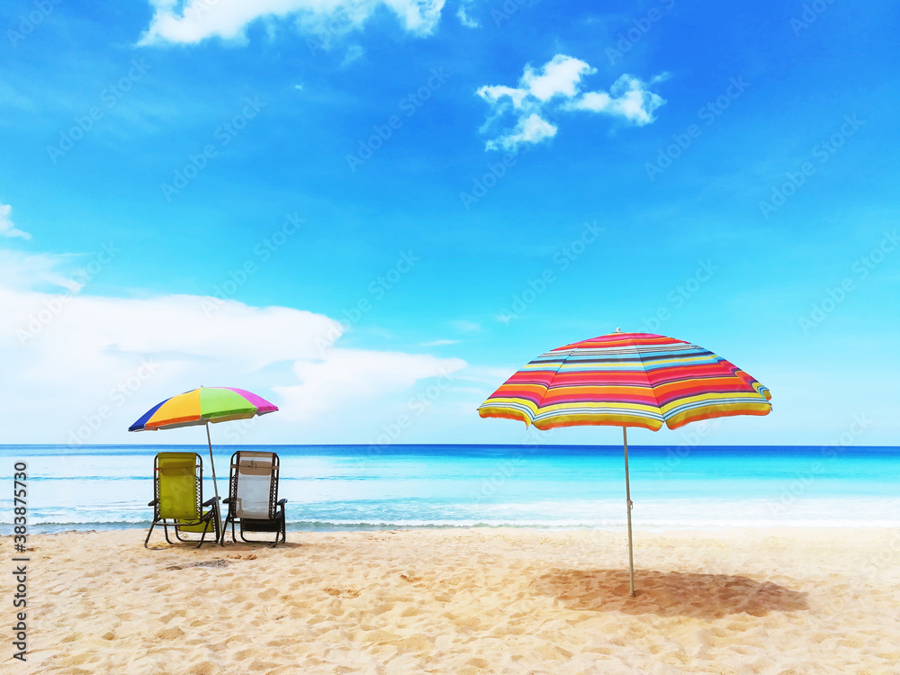 Umbrellas and chair on beach in vacation.