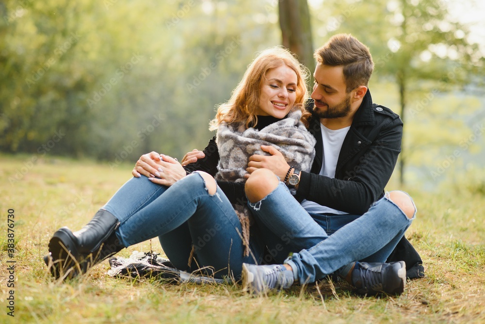 Fototapeta premium Happy young couple in love at the park.