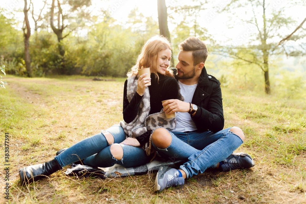 Romantic young couple in love relaxing outdoors in park Romantic young couple in love relaxing outdoors in park