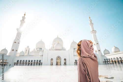 Woman exploring Abu Dhabi Grand Mosque photo