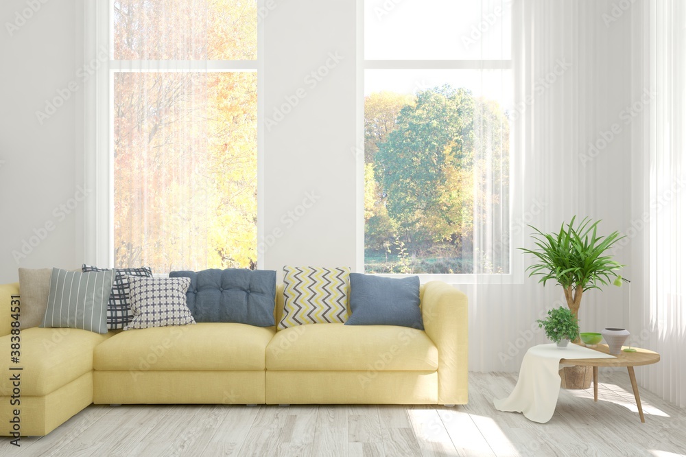 Stylish room in white color with sofa and autumn landscape in window. Scandinavian interior design. 3D illustration Stylish room in white color with sofa and autumn landscape in window. Scandinavian interior design. 3D illustration