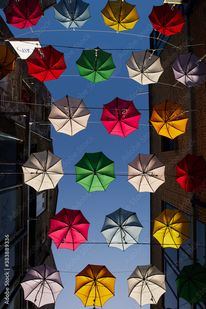 A row of umbrellas suspended in a street in Dublin, Ireland