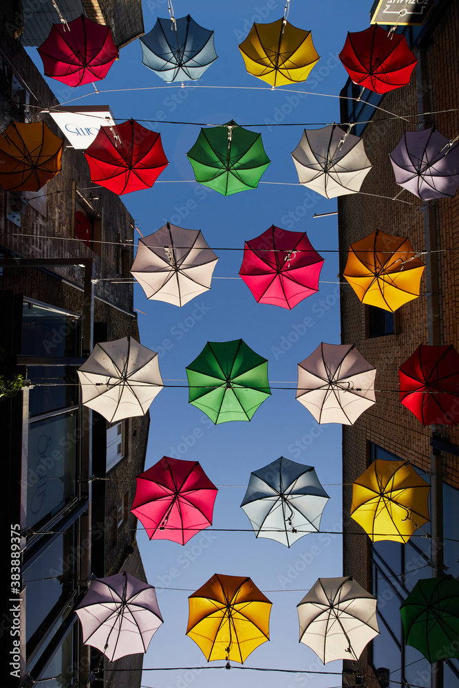 A row of umbrellas suspended in a street in Dublin, Ireland