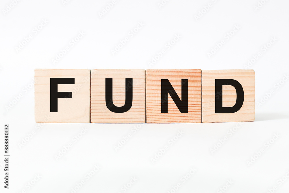 words FUND on wooden cubes, white background. business concept