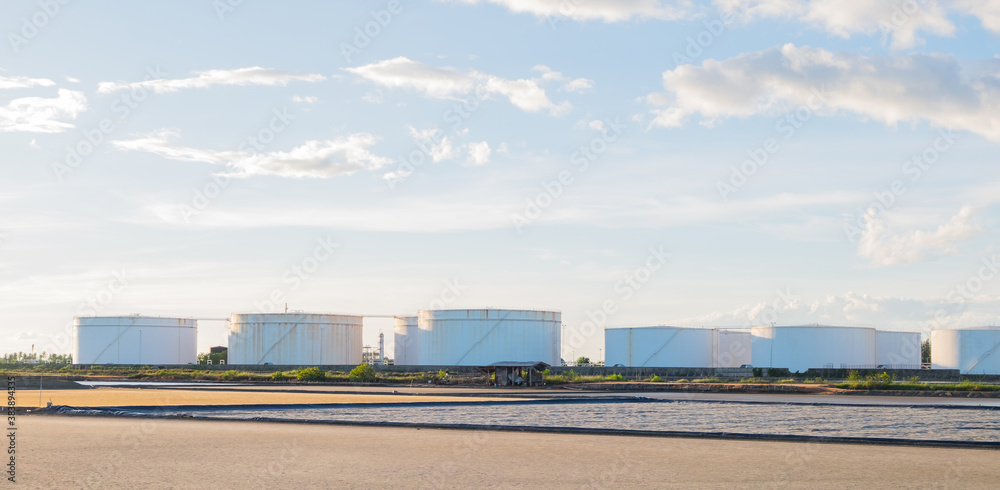 Large petroleum tanks with countryside