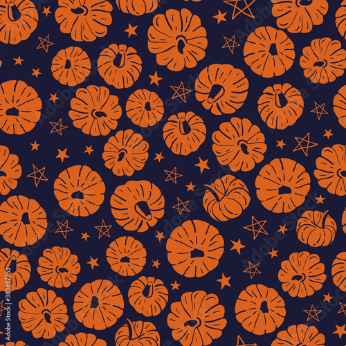 Vector orange pumpkins stars dark seamless pattern