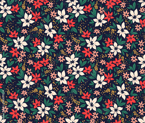 Seamless floral pattern with winter plants. Winter floral background. Colorful pattern with Christmas floral elements on a blue background. Holiday design for Christmas and New Year fashion prints.