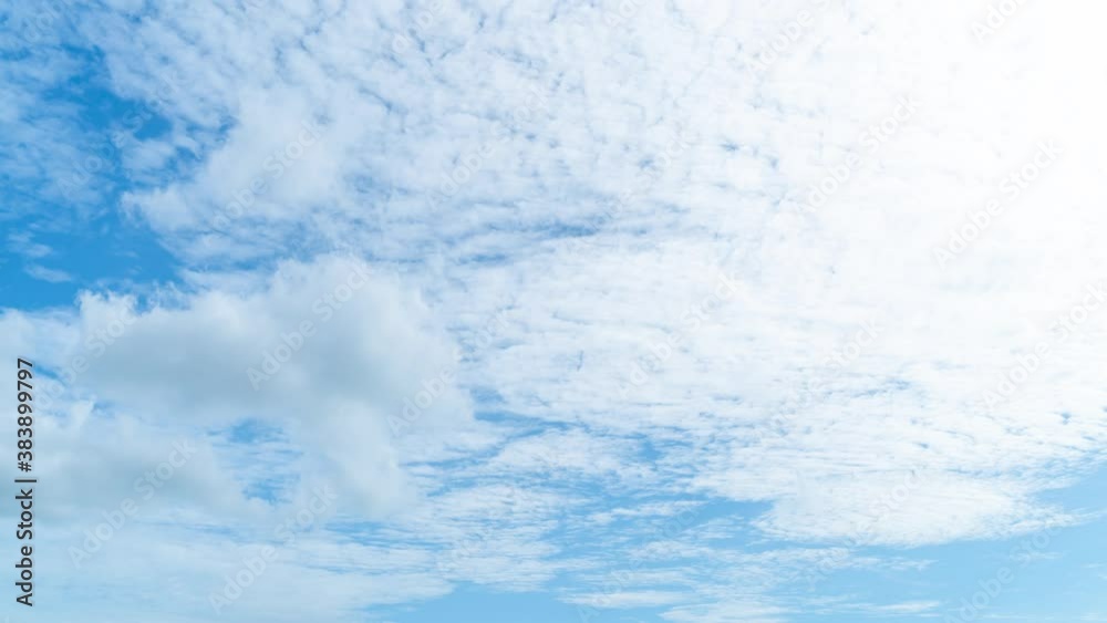Blue sky with white clouds moving timelapse summer. Sea in light of day aerial view of drone slide forward. Small waves on sea. Sunny sunset over the sea. Sun way. at Phuket Thailand Blue sky with white clouds moving timelapse summer. Sea in light of day aerial view of drone slide forward. Small waves on sea. Sunny sunset over the sea. Sun way. at Phuket Thailand