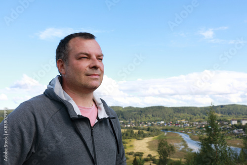 Man Posing On Mount Paaso in Karelia