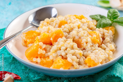 Homemade risotto with pumpkin and parmesan.
