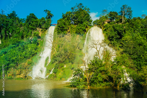 Fototapeta Naklejka Na Ścianę i Meble -  Dai Yem waterfall and red heart bridge. This is a nice waterfall in Moc Chau, Son La province, Vietnam.