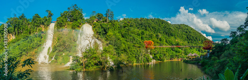 Dai Yem waterfall and red heart bridge. This is a nice waterfall in Moc Chau, Son La province, Vietnam. photo