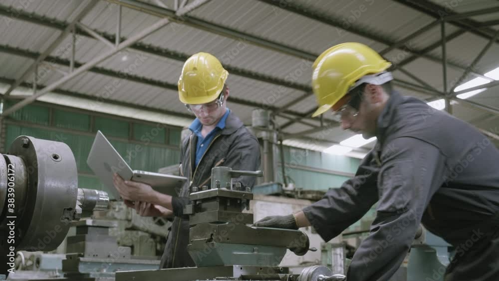 Team engineer working looking laptop computer, two man planning project, technician inspect and fix machine, entrepreneur management and control in factory, industrial and construction concept. Team engineer working looking laptop computer, two man planning project, technician inspect and fix machine, entrepreneur management and control in factory, industrial and construction concept.