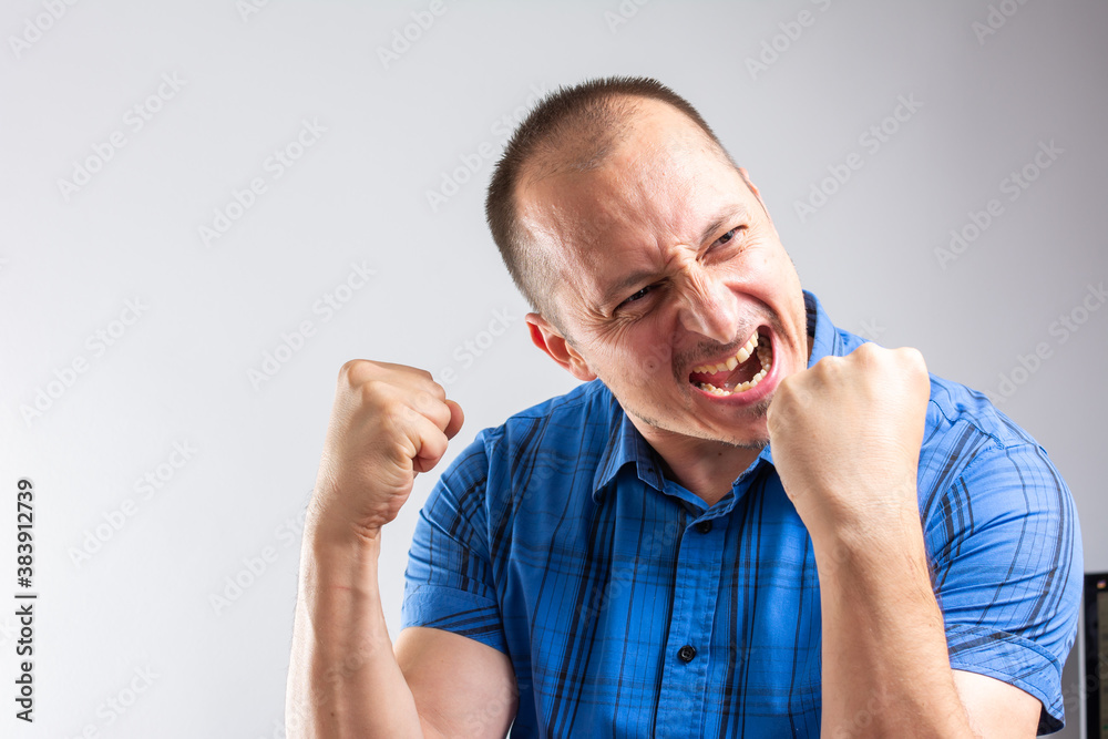 Close up shot of happy successful Portrait of an excited handsome man Close up shot of happy successful Portrait of an excited handsome man
