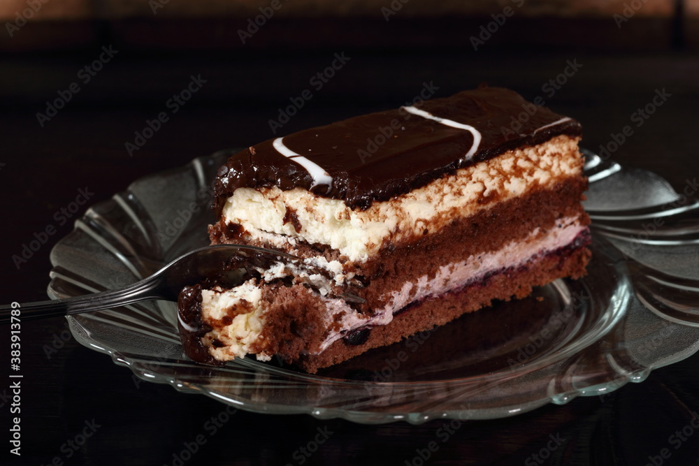 Layer cake with fruit and cream fillings decorated chocolate icing Layer cake with fruit and cream fillings decorated chocolate icing