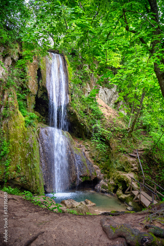 Mountain waterfall Ripaljka in the forest park Ozren