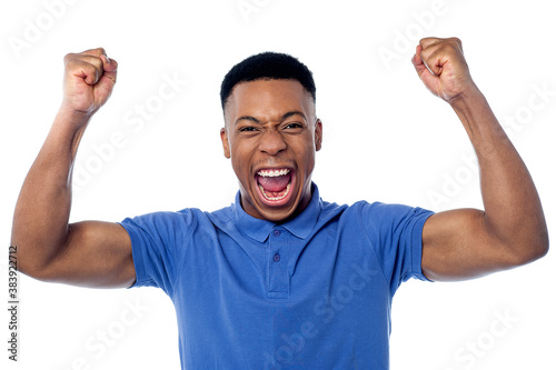 Young handsome victorious guy
