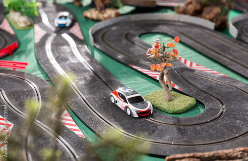 Racing electric car on the toy race track © JackF